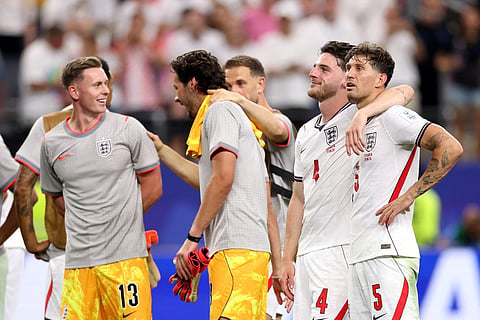 Declan Rice #4 and John Stones #5 of England celebrate after the 4-2 win during the FIFA World Cup 2026 Group L match between England and Croatia at Dallas Stadium on June 17, 2026 in Arlington, Texas.