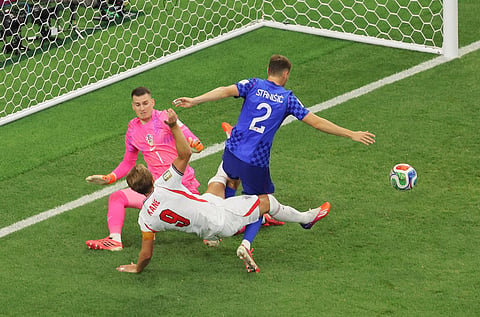 Dominik Livakovic #1 in pink, during the FIFA World Cup 2026 Group L match between England and Croatia at Dallas Stadium on June 17, 2026 in Arlington, Texas.