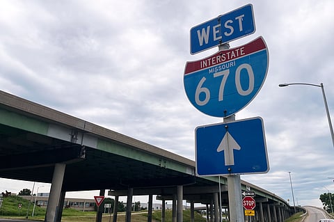 A sign for I-670 is seen near the site of a shooting Thursday, June 18, 2026, in Kansas City, Mo. (AP Photo/Heather Hollingsworth)