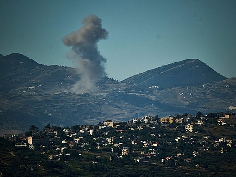 Smoke rises to the sky following an Israeli military strike in southern Lebanon as seen from northern Israel, on Friday, June 19, 2026.