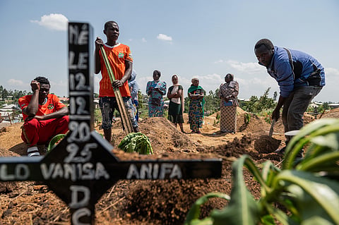 Relatives of Vanisa Anifa, a 6-month-old orphaned girl who died of Ebola, attend her burial, in Bunia, Congo, Friday, June 19, 2026.