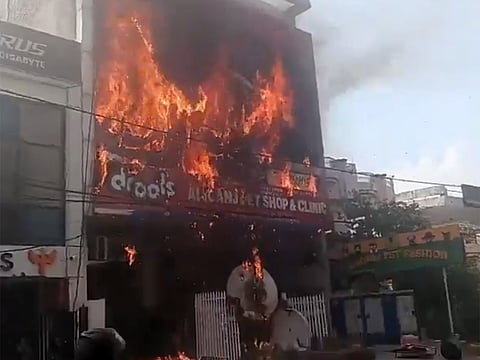 Bystanders said that several people, including students, were trapped inside the building, but there was no official confirmation on the exact number.