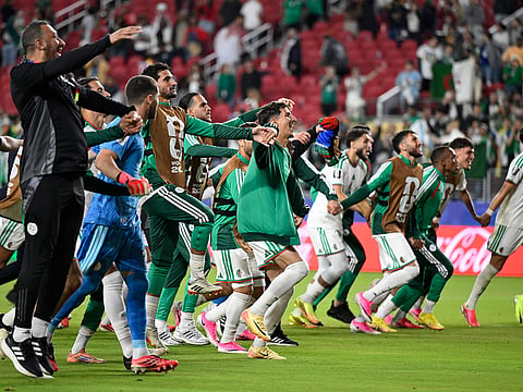 Players of Algeria react after the World Cup Group J soccer match against Jordan in Santa Clara, Calif.,