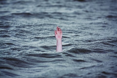 Egyptian mother detained as authorities investigate the tragic drowning of her three children in Minya canal under suspicious circumstances.