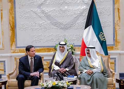This hand out photo provided by the Kuwait's news agency KUNA on June 24, 2026 shows the Amir of Kuwait Sheikh Meshal al-Ahmad al-Jaber al-Sabah (R) receiving the US Secretary of State Marco Rubio at Bayan Palace in Kuwait City.