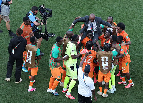 Ivorian Football Federation President Yacine Idriss Diallo is lifted by players after the team's 2-0 victory and advance to the knockout stage following the FIFA World Cup 2026 Group E match between Curacao and Cote D'Ivoire at Philadelphia Stadium on June 25, 2026 in Philadelphia, Pennsylvania.