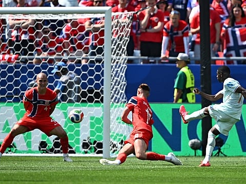 France's forward Ousmane Dembele scores his team's third goal during the 2026 World Cup Group I football match against Norway at the Boston Stadium in Foxborough on June 26, 2026.
