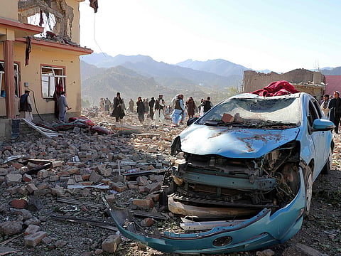 Afghan residents look at the remains of a building damaged in a Pakistani airstrike at a village in Tsamkani district of Afghanistan's Paktia province on June 29, 2026.