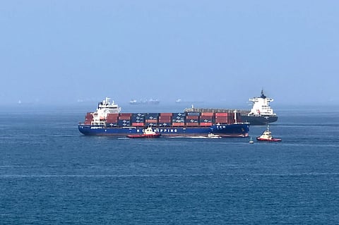 While many vessels have been held outside Hormuz Strait or rerouted, ship trackers have reported fluctuating but generally low-to-moderate daily transits in recent days. Photo shows a cargo ship is pictured off coast of the Khor Fakkan Container Terminal on June 28, 2026.