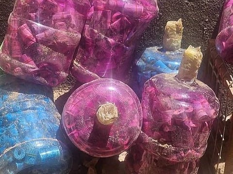 Billions of Iraqi dinars in cash and large quantities of gold concealed inside plastic containers found in Tikrit.