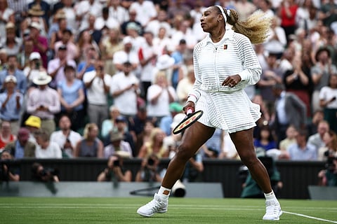 US player Serena Williams warms up prior to playing Australia's Maya Joint during their women's singles first round tennis match on the second day of the 2026 Wimbledon Championships at The All England Lawn Tennis and Croquet Club in Wimbledon, southwest London, on June 30, 2026.