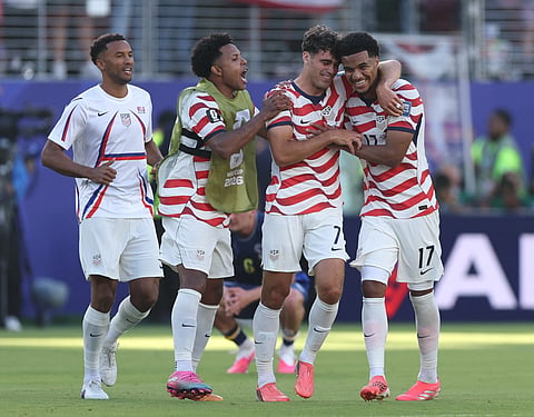 Weston McKennie #8, Giovanni Reyna #7 and Malik Tillman #17 celebrate victory after the FIFA World Cup 2026 Round of 32 match between USA and Bosnia and Herzegovina at San Francisco Bay Area Stadium on July 01, 2026 in Santa Clara, California.
