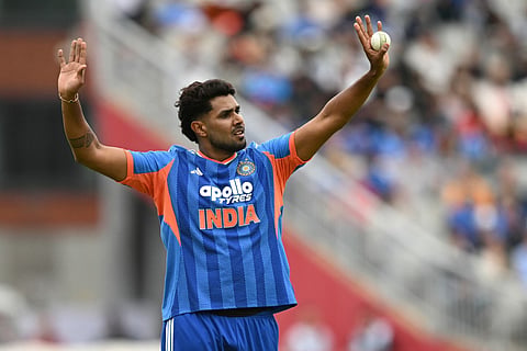 India's Harshit Rana prepares to bowl during the second Twenty20 (T20) international cricket match between England and India at Old Trafford in Manchester, north-west England on July 4, 2026.