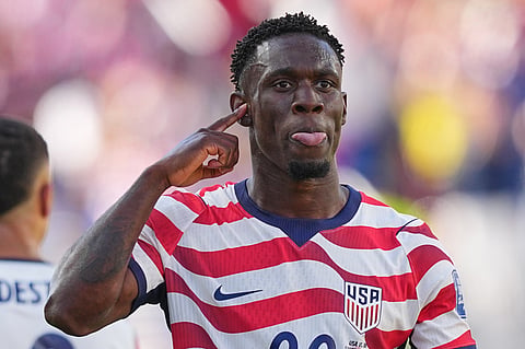 United States' Folarin Balogun (20) reacts after scoring his team's first goal during the World Cup round of 32 soccer match between the United States and Bosnia in Santa Clara, Calif., near San Francisco, Wednesday, July 1, 2026. (AP Photo/Julio Cortez)