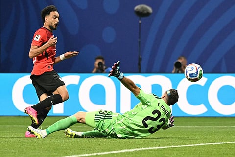 Egypt's midfielder Mostafa Ziko scores a goal after a previous one is disallowed by VAR during the match between Argentina and Egypt.