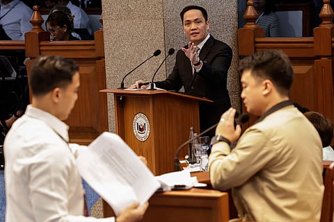 Prosecution counsel Amando Ligutan (C) reacts as defence counsel Carlo Narvasa (L) questions witness John Mark Calilung (R), a National Bureau of Investigation senior agent, during proceedings of the impeachment trial of Philippine Vice-President Sara Duterte (not pictured), at the Philippine Senate in Pasay City, Metro Manila on July 8, 2026.