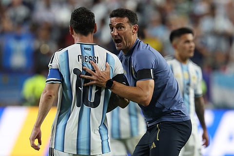 Argentina's head coach Lionel Scaloni gives instructions to Argentina's forward #10 Lionel Messi during the last minutes of the 2026 World Cup football tournament quarter-final match between Argentina and Switzerland at the Kansas City Stadium in Kansas City on July 11, 2026.