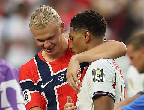 Erling Haaland #9 of Norway and Jude Bellingham #10 of England et the end of the game during the FIFA World Cup 2026 Quarter Final match between Norway and England at Miami Stadium.