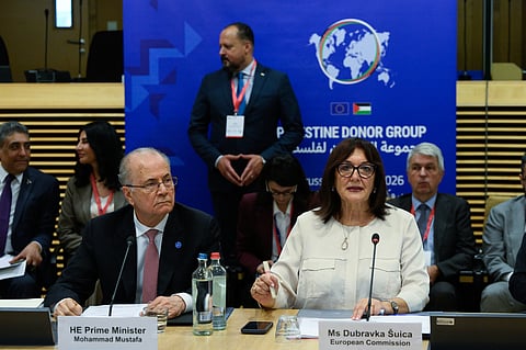 European Commissioner for the Mediterranean Dubravka Suica, right, and Palestinian Prime Minister Mohammad Mustafa participate in a round table meeting of the Palestinian Donor Group at EU headquarters in Brussels, Monday, July 13, 2026. (John Thys, Pool Photo via AP)