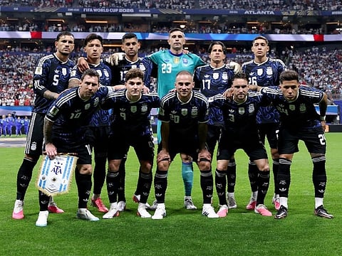 Led by a record-breaking Lionel Messi, the defending champions Argentina overcame dramatic challenges to set up a title clash with Spain.