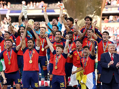 Rodri of Spain lifts the FIFA World Cup Winner’s Trophy alongside U.S. President Donald Trump after the team’s victory following during the FIFA World Cup 2026 Final