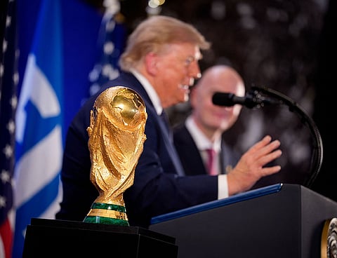 US President Donald Trump (C) speaks alongside FIFA President Gianni Infantino at a FIFA Reception at Trump Tower on July 17, 2026 in New York City.