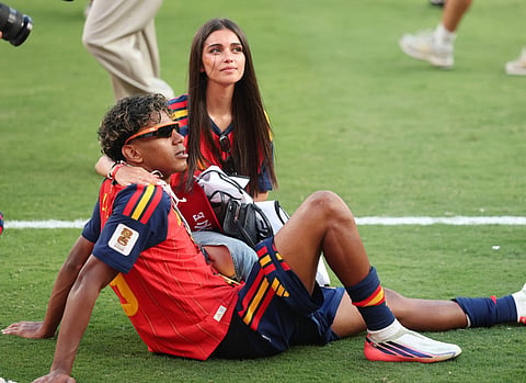 Lamine Yamal #19 of Spain celebrates with his girlfriend Ines Garcia after the team's victory following the FIFA World Cup 2026 Final match between Spain and Argentina at New York New Jersey Stadium on July 19, 2026 in East Rutherford, New Jersey.