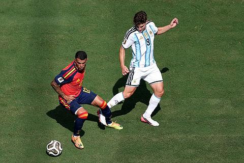 Pedro Porro #12 of Spain controls the ball against Julian Alvarez #9 of Argentina during the FIFA World Cup 2026 Final match between Spain and Argentina at New York New Jersey Stadium on July 19, 2026 in East Rutherford, New Jersey.