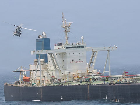 This US Marine Corps handout photograph taken on July 16, 2026, by US Central Command Public Affairs reportedly shows US Marines from the 11th Marine Expeditionary Unit conducting a verification boarding aboard M/T Wen Yao in the Gulf of Oman.