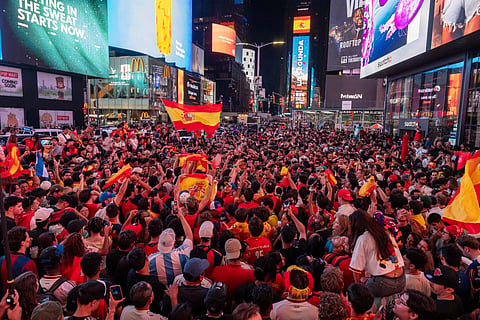 Spain fans celebrate in Times Square after the FIFA World Cup 2026 Final between Spain and Argentina on July 19, 2026 in New York City.