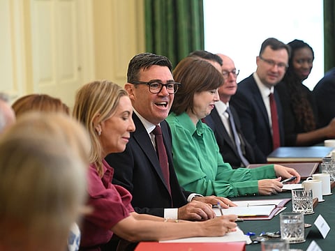 Britain's Prime Minister Andy Burnham, centre, attends his first cabinet meeting as prime minister at 10 Downing Street, London, Tuesday July 21, 2026.