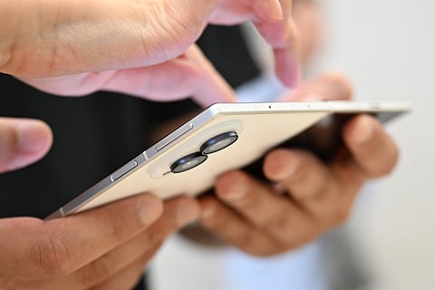 Customers try out a newly-released Samsung Galaxy Z Fold8 smartphone at a Samsung store in Seoul on July 23, 2026.