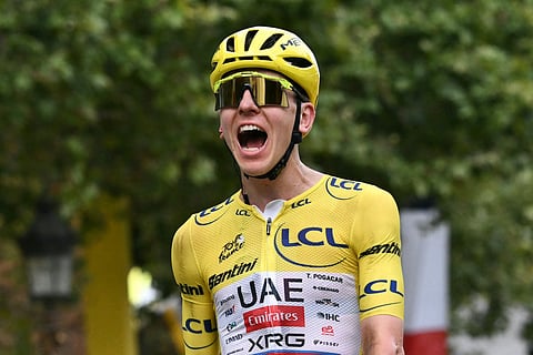 UAE Team Emirates - XRG's Slovenian rider Tadej Pogacar celebrates his overall victory after the 21st stage of the 113th edition of the Tour de France cycling race, 88,7 km starting and finishing in Paris, on July 26, 2026.