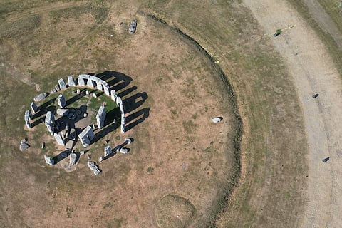 This aerial image shows the dried scorched grass surrounding Stonehenge near Amesbury, Wiltshire in southern England on July 28, 2026.