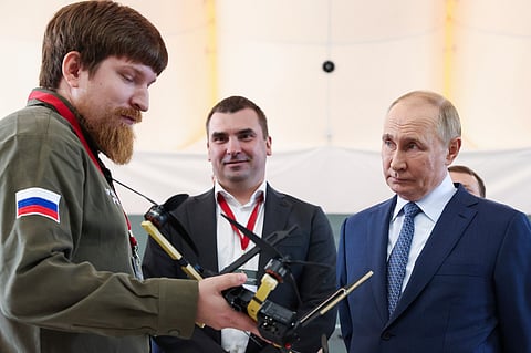 FILE - Russian President Vladimir Putin, right, speaks with Vladimir Tkachuk, the head of the Uraldronzavod, during his visit to the Special Technology Centre in St. Petersburg, Russia, Thursday, Sept. 19, 2024.