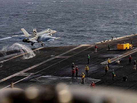 File photo: An F/A-18E Super Hornet launching from the flight deck of Nimitz-class aircraft carrier USS Abraham Lincoln.