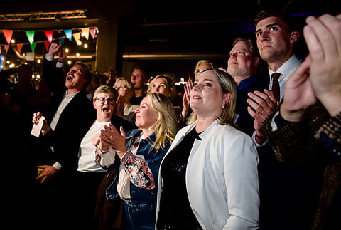 Leaders of the 'No' campaign react as early results from rural Iceland put the 'No' side ahead during an election-night gathering in Reykjavik, Iceland, Saturday, August 29, 2026.