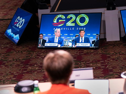 US Secretary of Treasury Scott Bessent and US Federal Reserve chairman Kevin Warsh are displayed on a TV screen as they speak during the G20 Finance Ministers and Central Bank Governors’ meeting in Asheville, North Carolina, on August 31, 2026.
