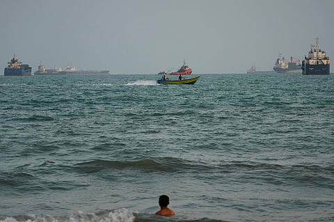 Commercial vessels anchored in the Strait of Hormuz off Bandar Abbas, Iran, Friday, Sept. 4, 2026.