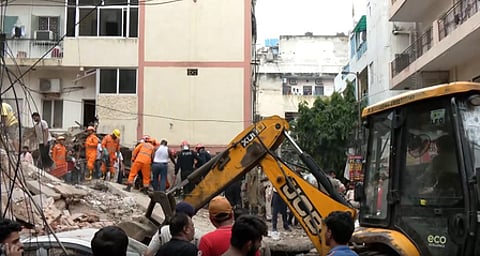 Delhi Police confirmed that at least two people had been rescued, while other media reports put the number pulled from the debris at six. Authorities had not confirmed how many people remained trapped.
