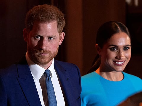 Britain's Prince Harry, his wife Meghan Markle and their two children, landed on August 26, 2026 in Britain