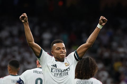 Real Madrid's French forward #10 Kylian Mbappe celebrates scoring his team's first goal during the UEFA Champions League first round day 1 football match between Real Madrid and Inter Milan at the Santiago Bernabeu stadium in Madrid on September 8, 2026.