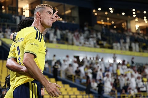 Nassr's Portuguese forward #07 Cristiano Ronaldo celebrates after scoring his team's first goal during the Saudi Pro League football match between Al-Nassr and Abha at the Al-Awwal Park stadium in Riyadh on September 9, 2026.