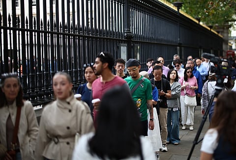People queue to enter the British Museum in London on September 10, 2026, on the first day of the Bayeux Tapestry exhibition.