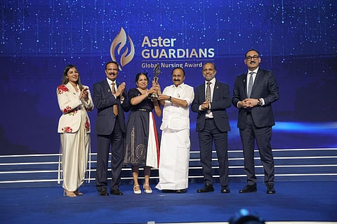 Agimol Pradeep (third from left), Aster Guardians Global Nursing Award 2026 winner