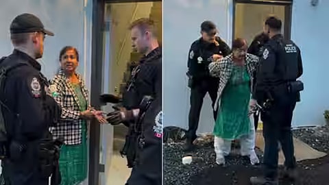 The woman, identified in Indian media reports as Raj Tiwana, was seen being handcuffed by police in Surrey, British Columbia.
