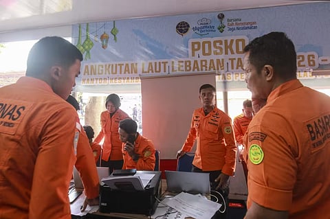 National Search and Rescue Agency (Basarnas) officers staff a rescue operations command post for the stricken Virgo Transport 8 ferry on Sunday.