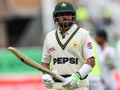 Pakistan's Babar Azam walks off after being dismissed on day three of the third test match between England and Pakistan at Edgbaston cricket ground in Birmingham, central England, on September 11, 2026.