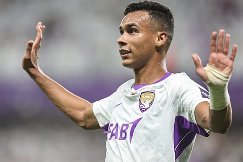 Ain's Moroccan forward #13 Houssine Rahimi celebrates after scoring his team's first goal during the AFC Champions League Elite (ACL) football match between Al-Ain and Al-Nassr at the Azza Bin Zayed stadium in Al-Ain on September 15, 2026.