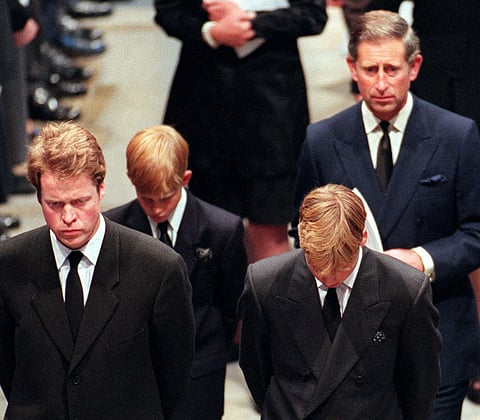 Earl Spencer, Diana's brother, her two sons Harry and William, and her former husband then-Prince Charles arrive at Westminster Abbey in London to attend the funeral ceremony of Diana, Princess of Wales, on September 6, 1997.
